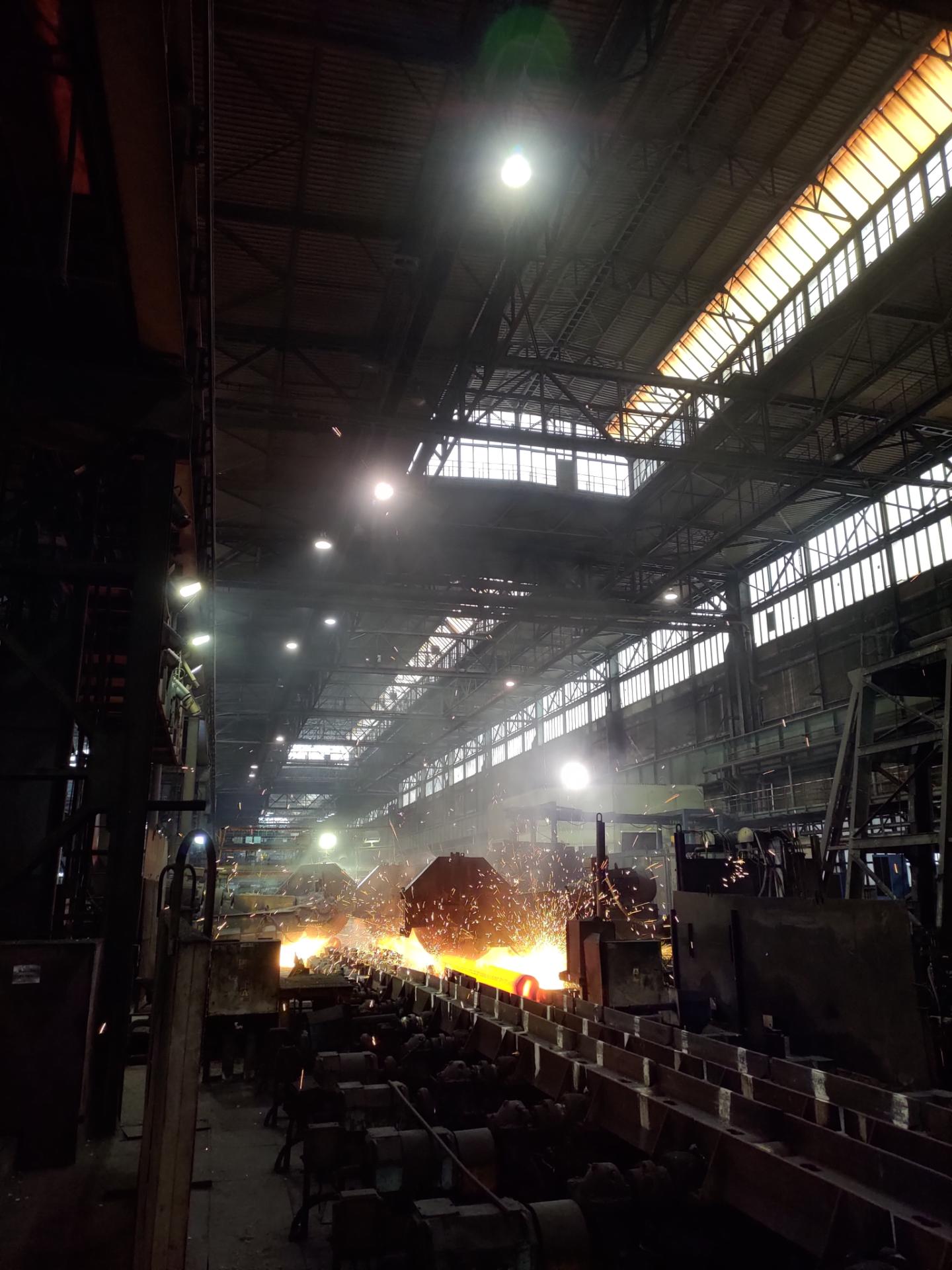 Sparks inside a metallurgy production hall